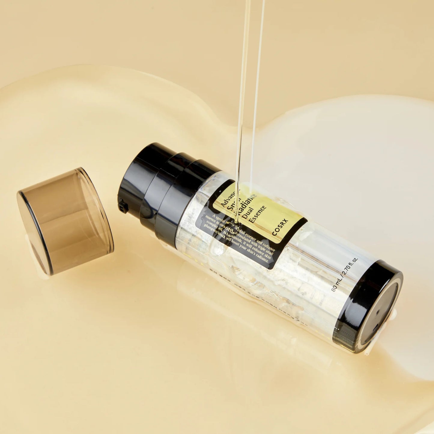 Cosrx Advanced Snail Radiance Dual Essence arcápoló, prémium koreai esszencia hidratáló formulával, niacinamiddal és csigamucinnal.